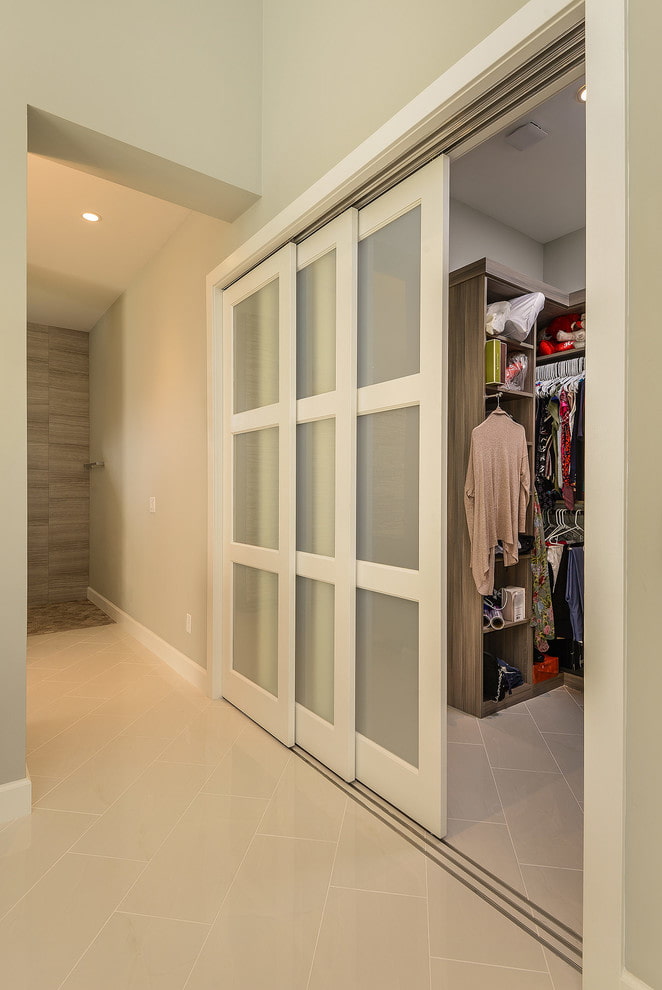 dressing room with white doors in the interior