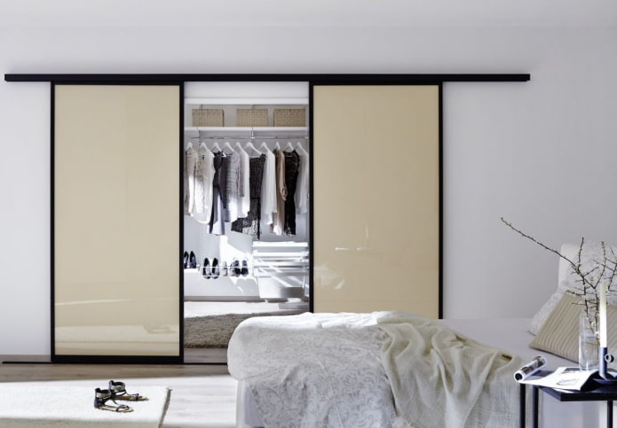 dressing room with beige doors in the interior