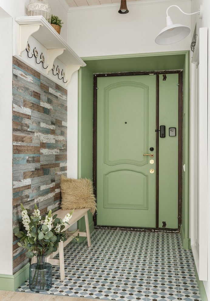 green entrance door in the hallway