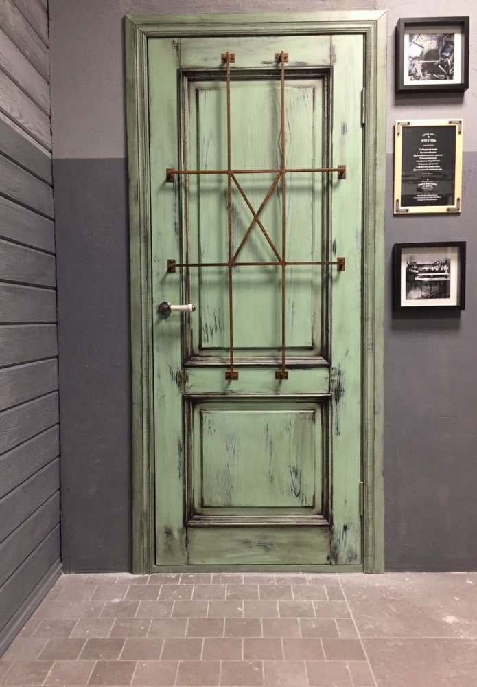 green doors in a loft style interior