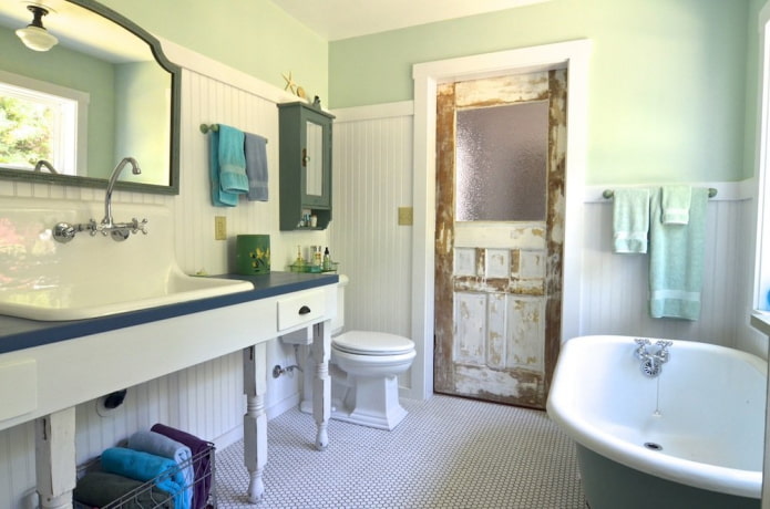 aged doors in the bathroom in the Provence style