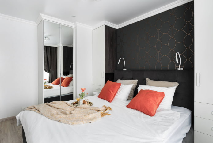 Bedroom with a mirrored wardrobe