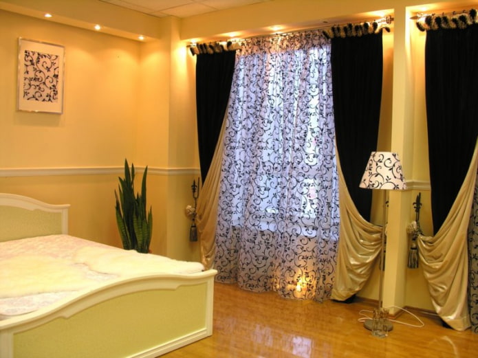 combination of black and gold on curtains in the bedroom
