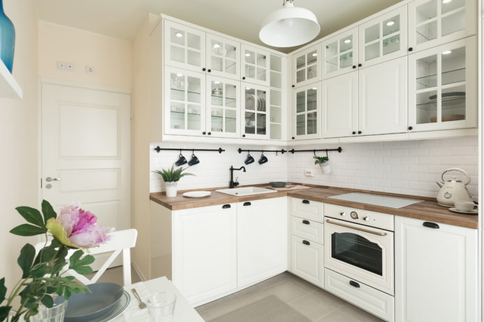 White kitchen with a white boar