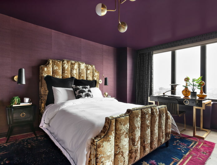 furniture in the interior of a purple bedroom