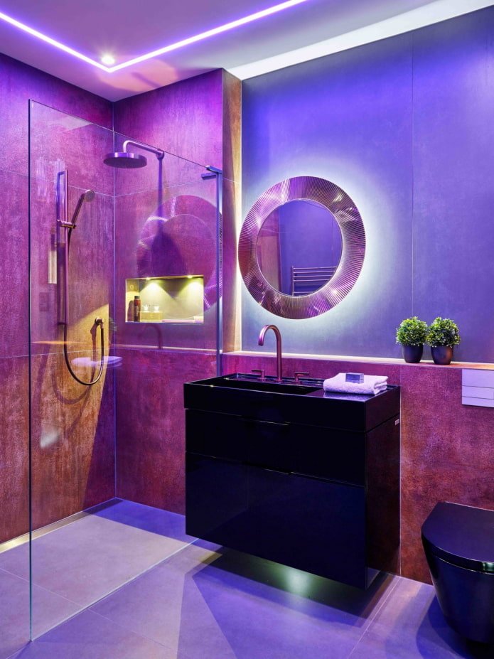 Black and purple bathroom with lighting