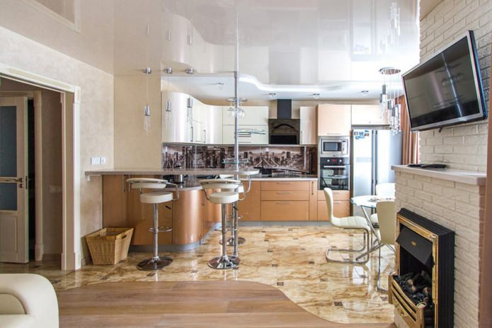 kitchen-living room design with a bar counter