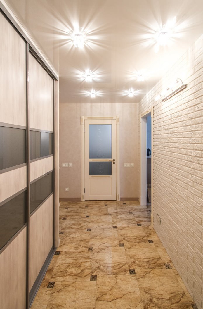 white brick in the interior of the hallway