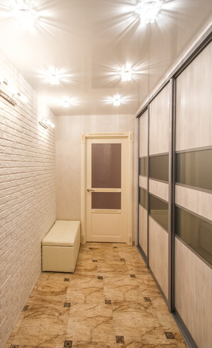 white brick in the interior of the hallway