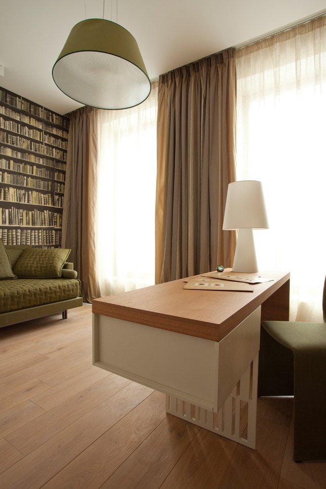 Decoration with space-expanding photo wallpaper featuring bookshelves