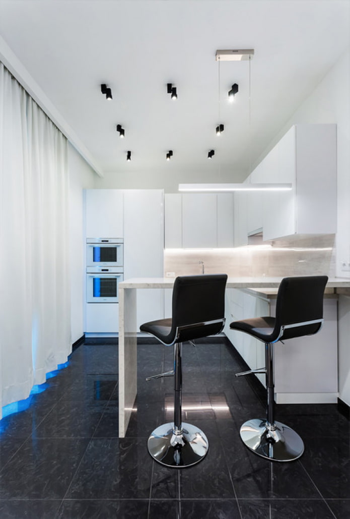 white kitchen with a bar counter