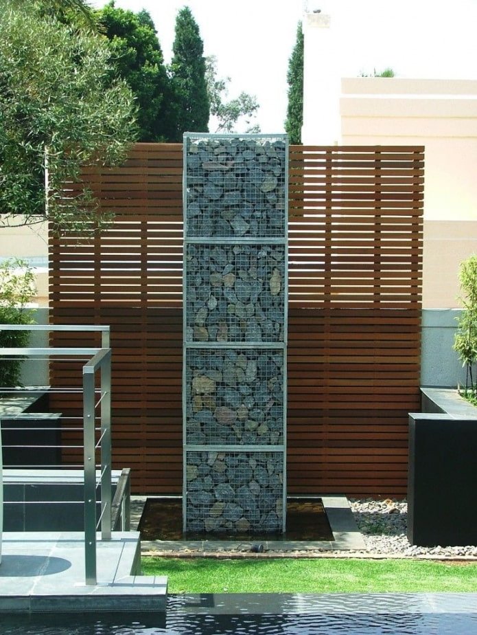 a combination of stone and wood in landscape design