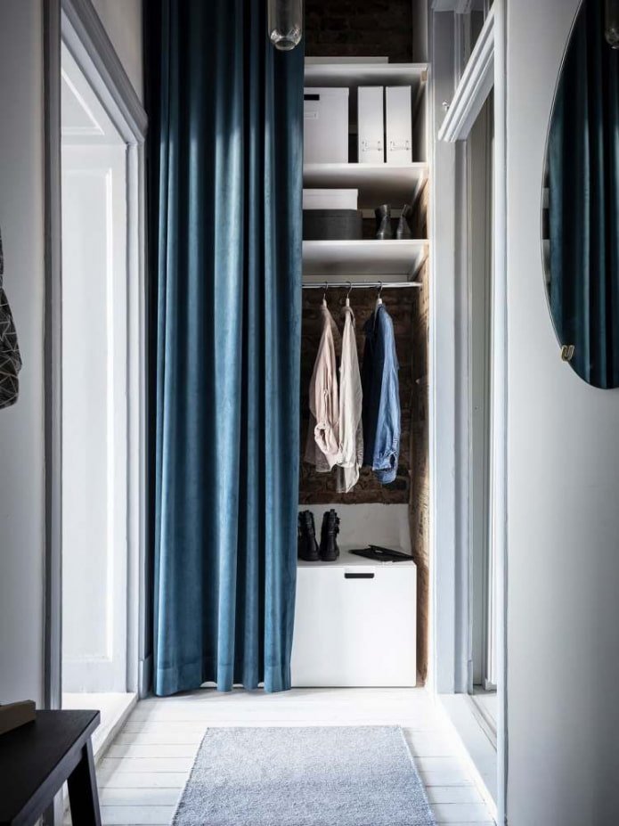 wardrobe in the interior of a small hallway