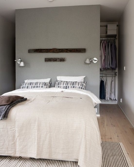dressing room behind the bed in the bedroom interior