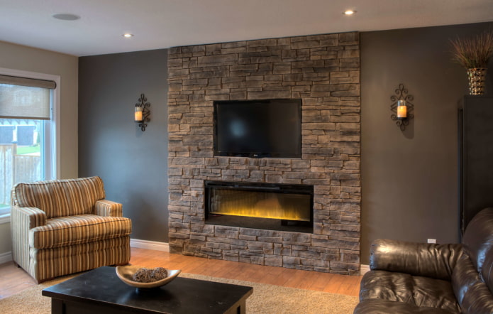 gypsum tiles in the decoration of the fireplace in the interior