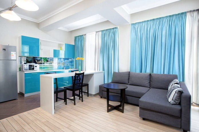 Blue color in the kitchen-living room interior