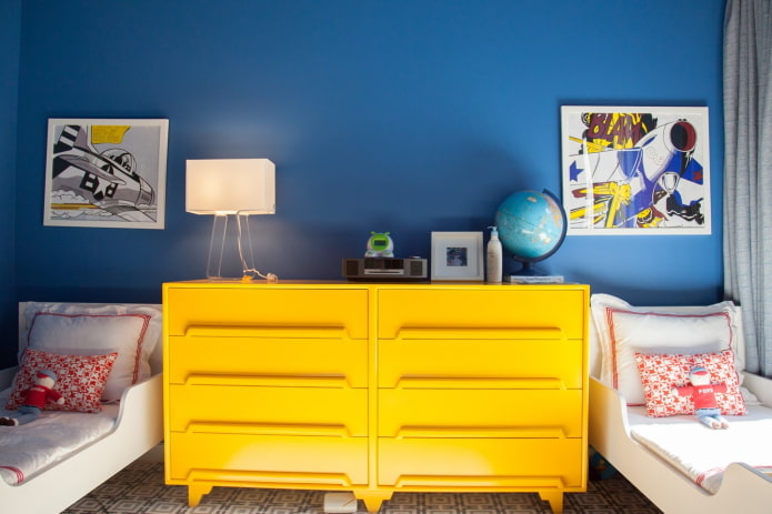 furniture in the interior of a nursery in blue tones