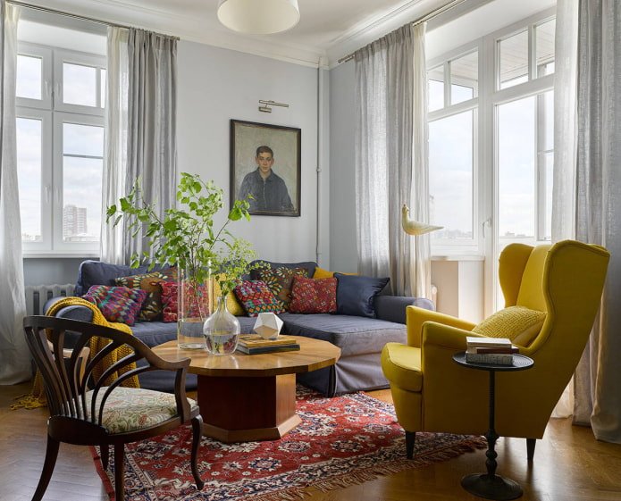 living room with a window and a balcony
