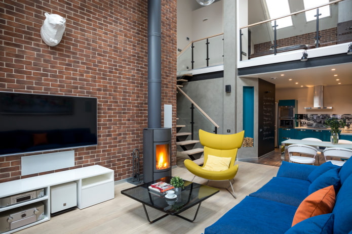 wood-burning fireplace and TV in the living room interior