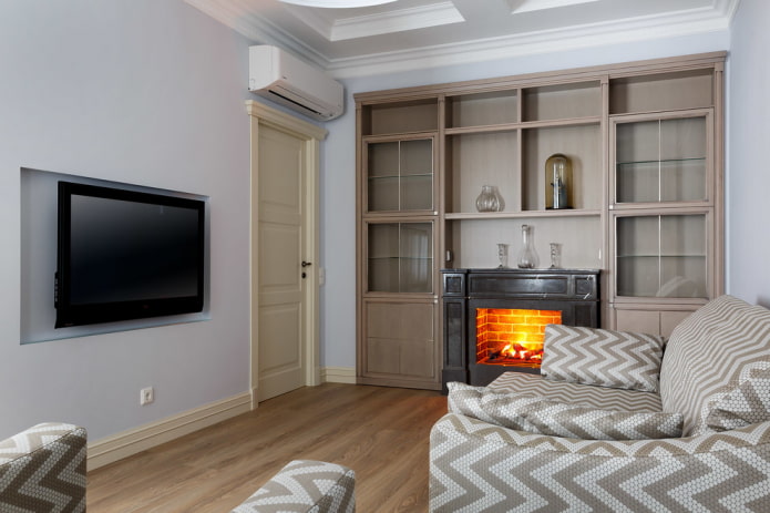 fireplace and TV in the interior of a small living room