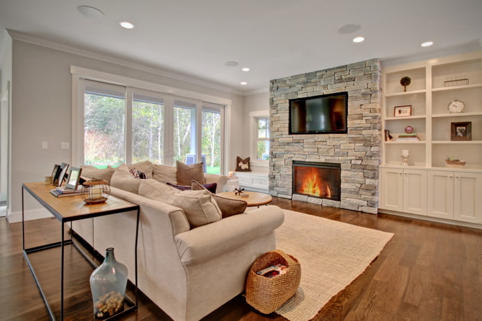 fireplace and TV in the interior of the living room in a country house