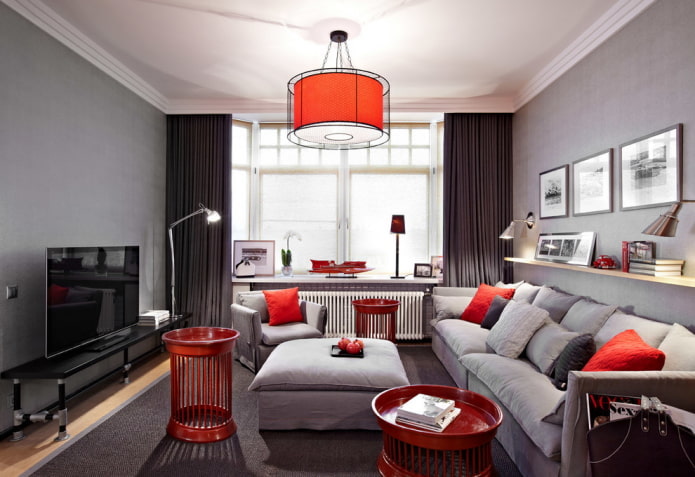red details in a gray living room