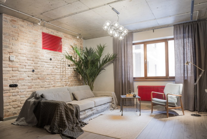 Grey living room and red details