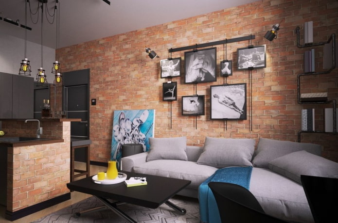 Posters and paintings on a brick wall
