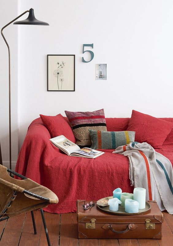 Sofa under a bedspread
