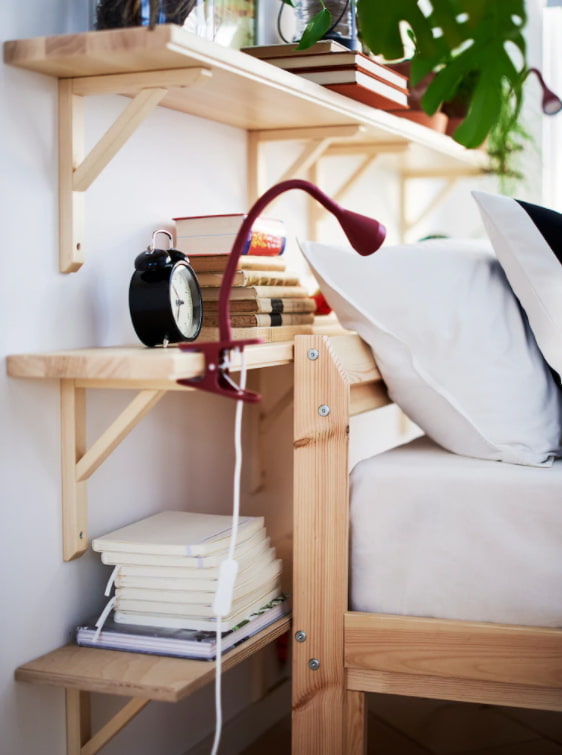 SANDSHULT shelf behind the bed 