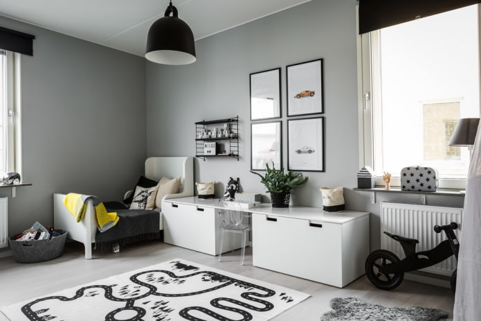 furniture and decor in the interior of a gray nursery
