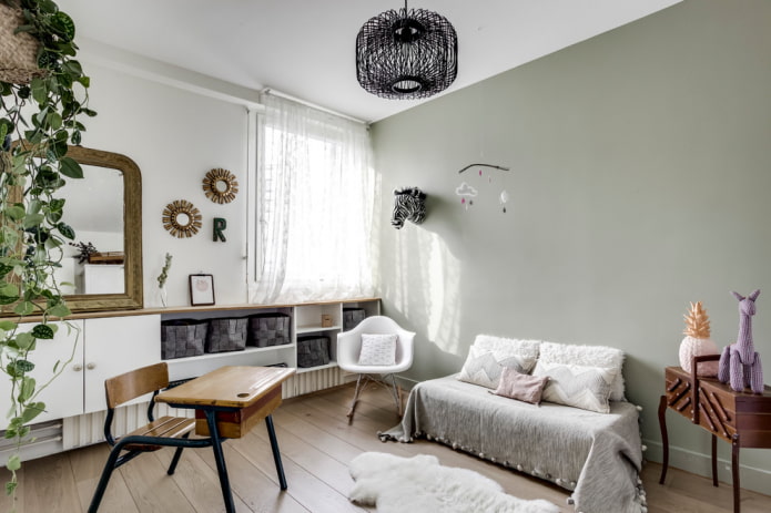 furniture and decor in the interior of a gray nursery