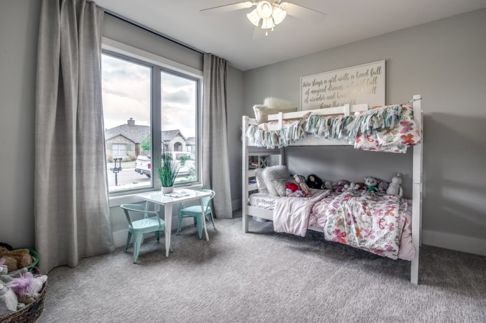 curtains in the interior of a gray nursery