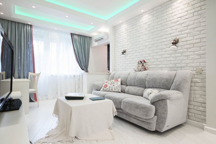 living room with white brick wallpaper