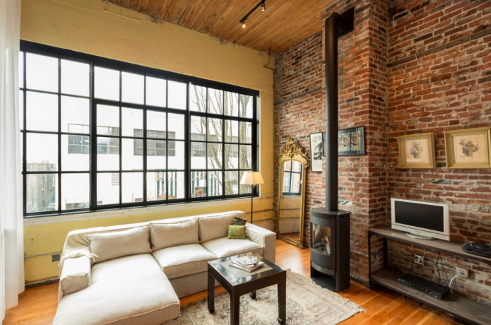 fireplace in the living room interior in loft style