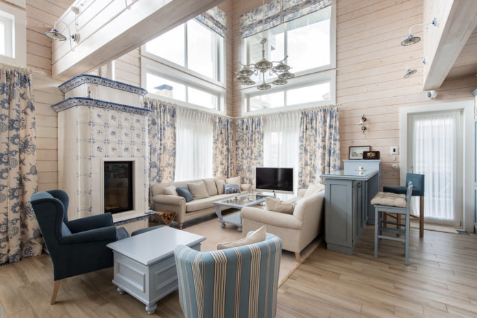 white and blue curtains in combination with the upholstery of the chairs