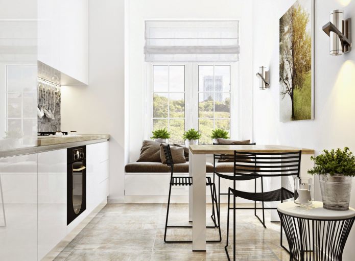 kitchen with a sofa by the window
