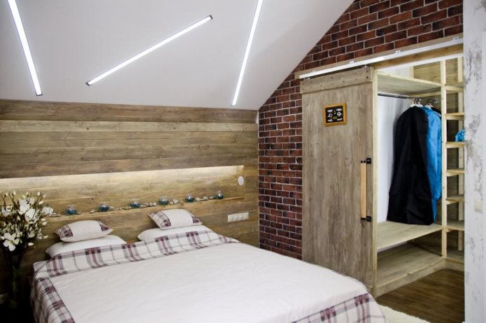 design project of an attic bedroom with a dressing room