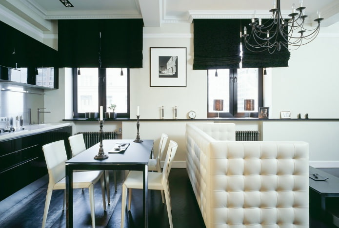 Black and white kitchen-living room interior