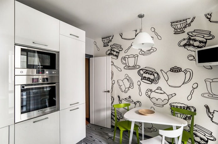 black and white kitchen interior with the addition of green