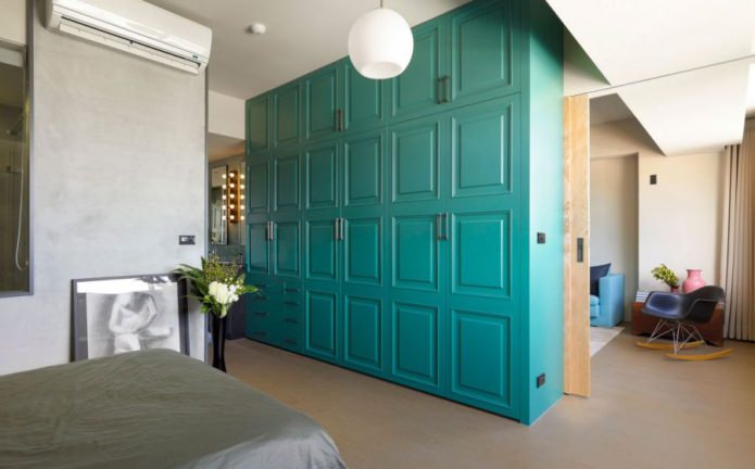 wardrobe dividing the room into two zones