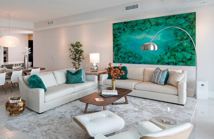 painting and pillows in aquamarine tones