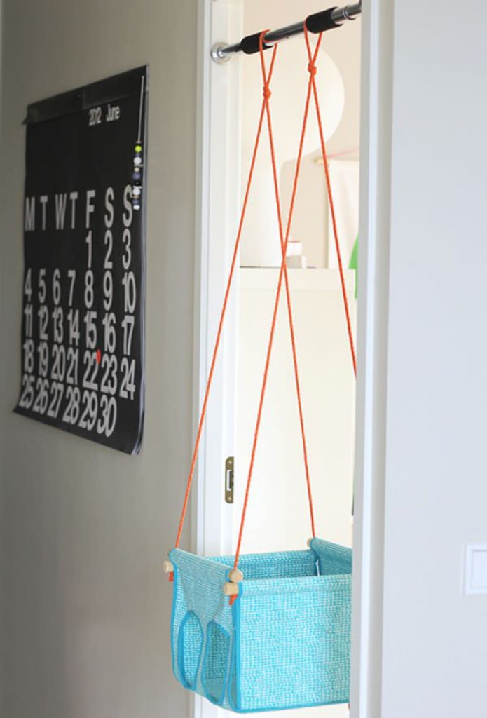 children's swing in the doorway
