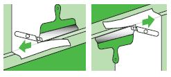 cutting off excess wallpaper with a metal spatula