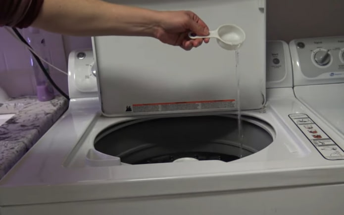 pour in the detergent