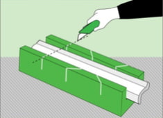 How to glue a ceiling plinth to a stretch ceiling: cutting with a miter box