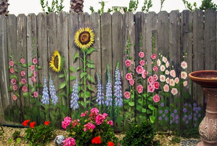 Drawings on a country fence