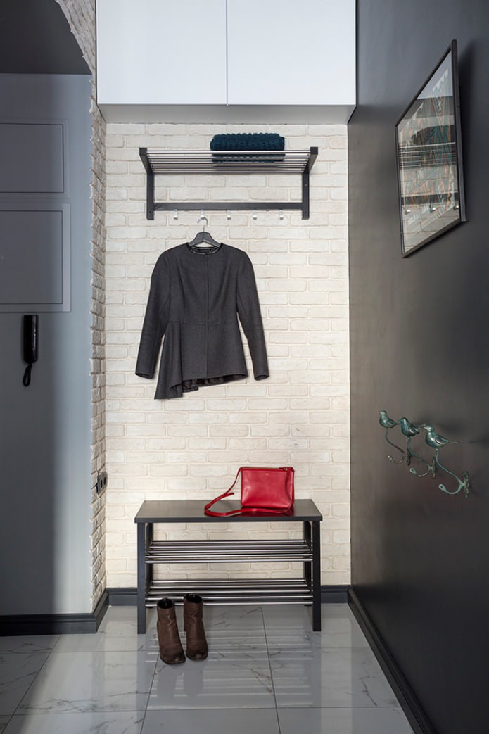 small hallway with brick wall cladding