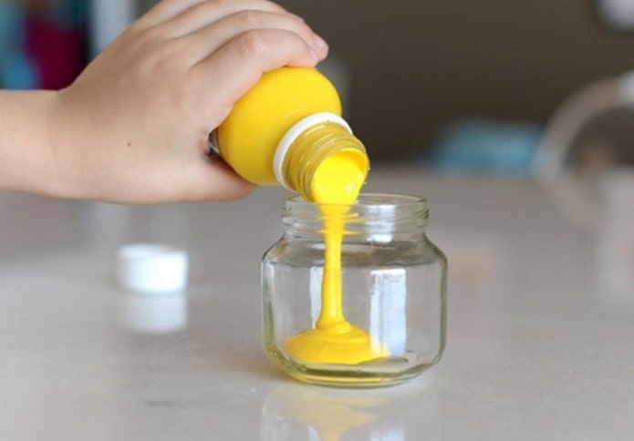 paint is poured into the jar