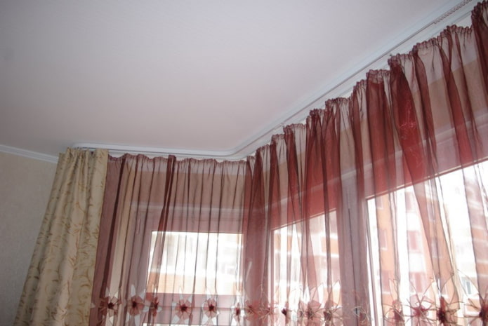 bay window with a track curtain rod